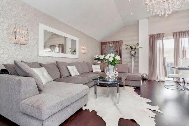 Diseño de sala de estar en tonos grises