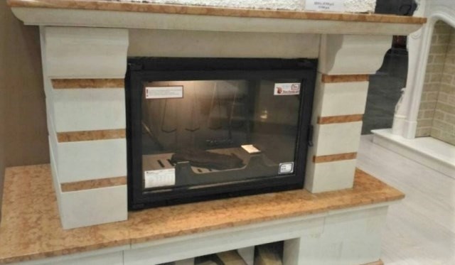 Instalación de una estufa de chimenea en una casa de madera en un ejemplo personal con una foto del proceso.