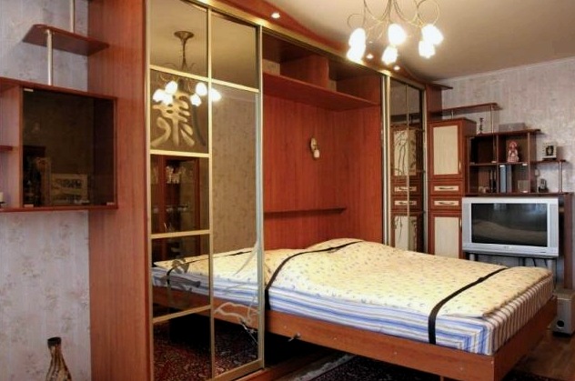 Dormitorio largo y estrecho: secretos del diseño.